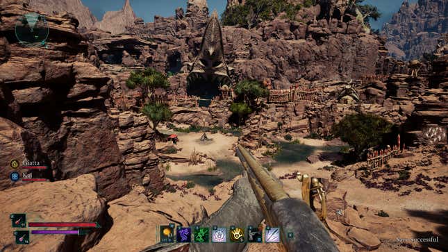 The player character looks out at a fantasy landscape set in a desert.