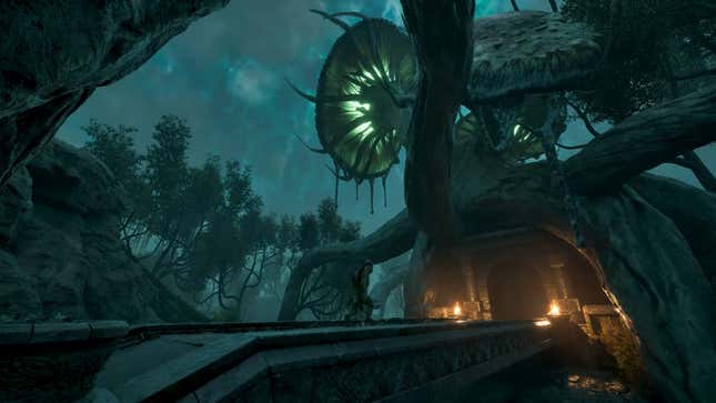 A bridge extends to a dark opening in a murky jungle.