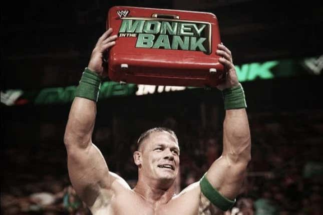 John Cena lifting the Money in the Bank briefcase