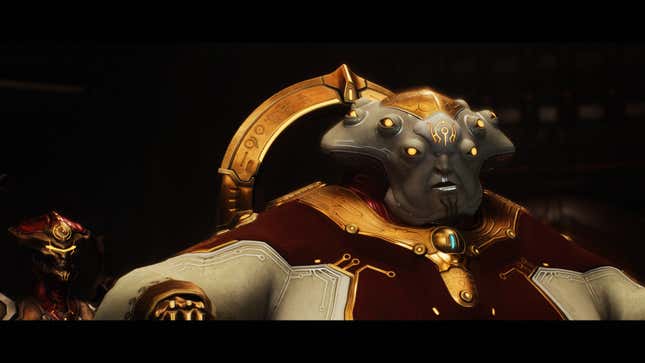 A massive alien with multiple eyes looks off-camera.